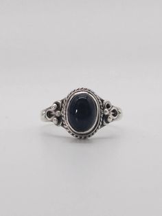 A cabochon oval onyx, rub set into silver ring Oval Onyx Cabochon Ring, Formal Onyx Oval Cabochon Jewelry, Silver Oval Onyx Jewelry, Oval Cabochon Onyx Ring Gift, Black Oval Cabochon Sterling Silver Jewelry, Rings Statement, Silver Fashion, Hippie Boho, Onyx