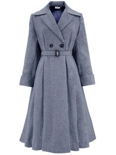 Our iconic Promenade coat is now available in a flecked navy shade. This stylish outerwear choice is a classic piece of 1940s history, brought to your wardrobes in a premier wool blend fabric. * Square shoulders, a large collar, and shoulder pads. * A wrap-across front, with two buttons showing, and internal fastening ribbons. * Set-in sleeves with deep cuffs. * A waist seam that has secured pleats into the bodice and skirt. * Matching fabric belt with a brown buckle and silver eyelets. * Fully Vintage Long Coat For Office, Vintage Peacoat For Fall Workwear, Vintage Double-breasted Outerwear For Office, Vintage Blue Notch Lapel Outerwear, 1940s History, Square Shoulders, 1940s Coat, 1940s Fashion Women, 1940s Jacket