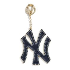 the new york yankees keychain is shown in blue and gold with crystals on it