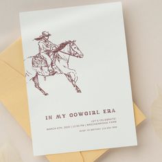 a card with a drawing of a cowboy riding a horse on the back of it