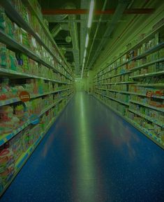 an aisle in a grocery store filled with lots of food and drink bottles on shelves