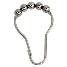 a metal hook with three balls hanging from it's end on a white background