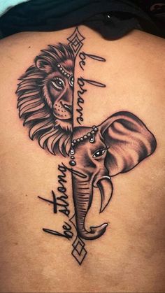 an elephant and lion tattoo on the back