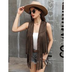 Material: This fringed vest is made of high quality fabric, which is soft and durable. When you receive the sleeveless tank top, run your fingers through your bangs to keep them straight Fitted Sleeveless Fringe Tank Top, Fitted Sleeveless Tank Top With Fringe, Sleeveless Brown Sweater Vest For Summer, Trendy Summer Fringe Outerwear, Trendy Summer Outerwear With Fringe, Fitted Tank Top For Fall Festivals, Fall Festival Sleeveless Tank Top, Brown Sleeveless Sweater Vest For Spring, Brown Sleeveless Tank Top For Fall