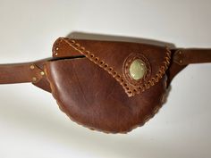 Beautiful Leather bag, One of a kind, belt bag, made in Antigua, Guatemala, Gift for her Everyday use or special occasions. One of a kind of it's style. 100% real leather. 100% handmade. - One Zipper Pocket back and One Pocket inside. Your bag is made 100% handmade. Shipping time: Between 5 - 10 working days. Leather Pouch Belt Bag Gift, Handmade Belt Bag Pouch As Gift, Handmade Pouch Belt Bag As Gift, Handmade Pouch Belt Bag For Gifts, Handmade Pouch Belt Bag For Travel, Handmade Brown Belt Bag As Gift, Handmade Brown Belt Bag For Gift, Handmade Brown Belt Bag Gift, Handmade Rectangular Belt Bag As Gift