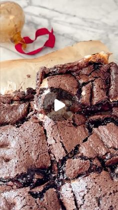 chocolate brownies cut in half on a table