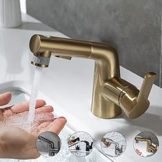 a person washing their hands under a faucet