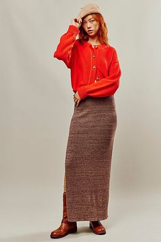 Our top-rated Golden Hour Midi, reimagined as a timeless maxi skirt! Featured in the perfect knit fabrication for a cozy, wear-with-everything feel. **Fit:** Mid-rise, relaxed column silhouette **Features:** Pull-on design, sweater knit fabrication, slit hem feature **Why We ❤ It:** Effortless from season to season, pair this with toughened up moto boots or sporty sneakers for endless ways to wear. | Golden Hour Maxi Skirt by Free People in Brown, Size: L Cozy Wear, Long Skirt Outfits, French Roast, Sporty Sneakers, Knit Midi Skirt, Moto Boots, Bottom Clothes, Sweater Knit, Knitting Inspiration