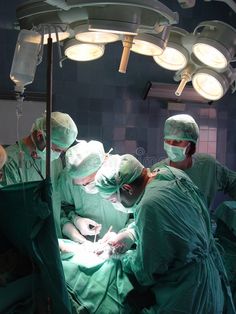 doctors performing surgery in an operating room