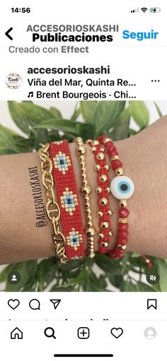 bracelets with evil eyes and beads on the wrist