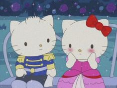 two hello kitty characters sitting next to each other in front of a night sky with stars