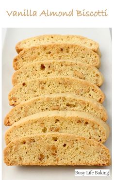 Baked vanilla almond biscotti arranged on a white plate Slivered Almond Biscotti, Vanilla Biscotti Recipe, Vanilla Almond Biscotti Recipe, Best Almond Biscotti Recipe, Almond Biscotti Recipe Easy, Keto Biscotti, Vanilla Biscotti, Chocolate Almond Biscotti