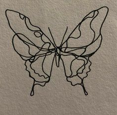 a drawing of a butterfly on a wall