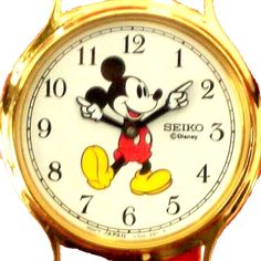 This Is A Beautiful New Seiko Mickey Mouse Men’s Watch Beautiful Gold Plated Case Stainless Steel Backing And An Elegant Leather Band. It States Seiko On The Back And Also On The Face Of The Watch And Mickey Points To The Correct Time For You! They Stopped Producing The Swatches In The Late 80s So Finding One In Brand New Condition It’s Next To Impossible. It Also Comes In The Original Seiko Mickey Mouse Case. Thank You For Looking At My Listing! Seiko Gold, Mickey Mouse Watch, Late 80s, Disney Men, Watch New, Mens Accessories Jewelry, Leather Band, Compass, The Face