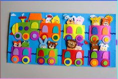 this is an image of children's felt wall hangings with animals on them