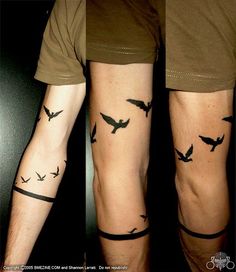 two tattoos with birds on their arms