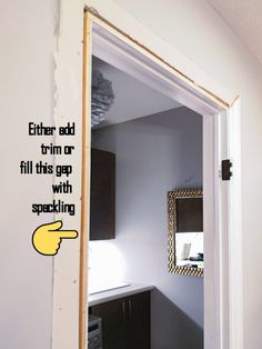 an open door leading to a bathroom with the words either add trim or fill this gap with spaking