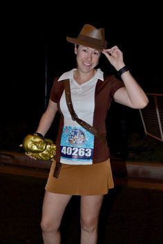 a woman in a costume is posing for the camera