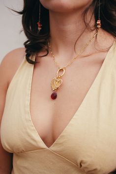 Unapologetically vibrant, backed in red enamel or radiating beams of pure gold, this charm dares you to wear your heart on your sleeve and love boldly, without hesitation. Materials & Dimensions 14k plated gold over brass; red enamel option 1.25" wide; 1.5" long Necklace Stacks, Necklace Stack, Heart On Your Sleeve, Modern Muse, Expression Of Love, Romantic Look, Layered Jewelry, Romantic Gifts, Delicate Details