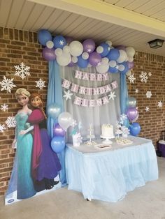 a frozen princess themed birthday party with balloons