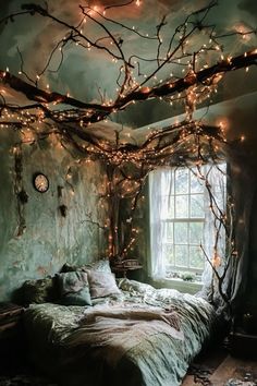 a bedroom decorated with branches and lights