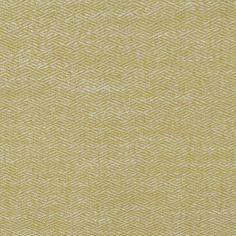 an upholstered yellow and white textured fabric