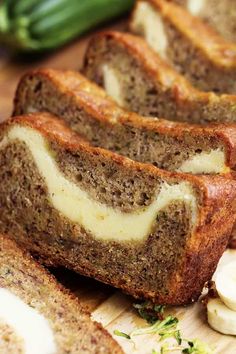 slices of banana bread sitting on top of a cutting board