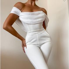 White Off Shoulder Flared Crepe Jumpsuit Size M Materials: Woven Stretch Crepe / Pleated Silk / Boned Corset Size M Sleek Jumpsuit, Miss Circle, Crepe Jumpsuit, Olive Green Pants, Belted Romper, Boned Corsets, Ruffle Jumpsuit, Older Fashion, White Off Shoulder