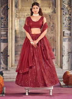 Get ready to turn heads at any special occasion with our red georgette lehenga. Elegant sequins and embroidery make this lehenga a stunning choice for weddings, parties, or as a bridesmaid or guest outfit. Comfortable and stylish, this readymade lehenga will make you feel confident and beautiful all day long. The unstitched blouse can be customized upto 46 inches. Do Note: All the accessories shown are for styling purpose only. Slight color variation may occur due to photographic reasons. Occasi India Style Dress, Lehenga Poses, Sangeet Dress, Traditional Closet, Maroon Lehenga, Chikankari Lehenga, Lehenga Bridesmaid, Lehenga Bridal, Lehenga Pattern