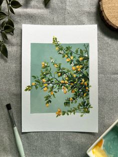 an image of some yellow flowers on a green and white background with paintbrushes