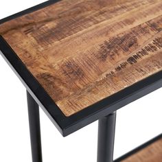 a wooden table with metal legs on a white background