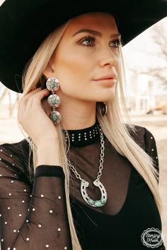 "Add some Southwestern flare to your outfit with our Concho Valley Earrings! These silver dangle conchos feature a stunning turquoise stone that will make a statement wherever you go. Embrace your inner cowgirl (or cowboy) and elevate your style with these unique earrings. Yeehaw!" length - 3.5" Draw Necklace, Crazy Train Clothing, Horseshoe Pendant, Western Boutique, Western Women, Western Wear For Women, Turquoise Stones, Unique Earrings, Turquoise Stone