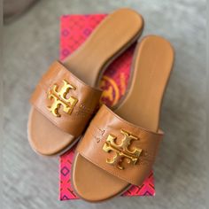 Amazing Tory Burch Every Slide Shoes!! New With Box! Size 7 Sold Out In A Stores Calf Luxurious Leather Very Comfortable And Stylish Looking Piece! Elegant Tan Sandals With Leather Lining, Luxury Tan Sandals With Leather Footbed, Designer Tan Sandals With Cushioned Footbed, Luxury Tan Open Toe Sandals, Luxury Tan Closed Toe Sandals, Luxury Tan Closed-toe Sandals, Designer Tan Sandals With Leather Lining, Luxury Tan Flat Heel Sandals, Designer Closed Toe Tan Sandals