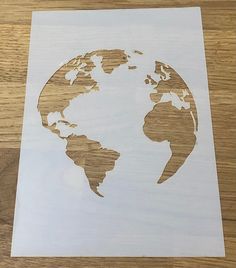 the earth is made out of wood and white paper