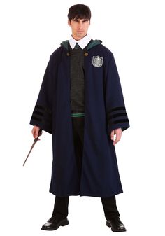 a man dressed in harry potter costume holding a wand and wearing a long blue coat