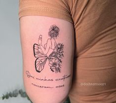 a woman with a butterfly tattoo on her arm