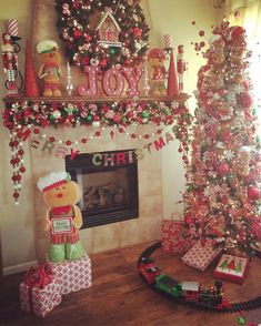 a decorated christmas tree in the corner of a living room