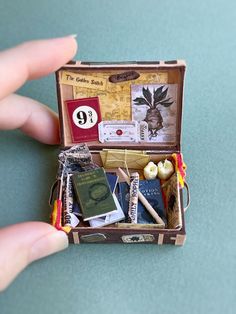 Miniature Harry Potter suitcase, scale 1:12. Completely handmade, this cute little set will be a wonderful addition to a dollhouse! To get acquainted with the work in more detail, follow the link Harry Potter Suitcase, Miniature Harry Potter, Halloween Cut Outs, Tiny Tower, Making Donuts, Magic Books, Miniature Set, Polymer Plastic, Dessert Set