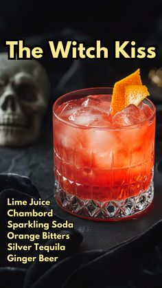 the witch kiss book cover with an orange garnish on it and a skull in the background