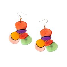 Brighten up your world with these fresh, colorful tagua flower earrings. Inspired by the flora of Ecuador and brought to life by our Ecuadorian artisans. Pair with our Florence Bracelet and Necklace to complete the look. Approximately 2" L Materials: Sustainable Tagua nut Ear wires are hypoallergenic, nickel free, and lead free Organic Vegetable Dyes Handmade in Ecuador Due to the nature and size of the tagua nuts, all sizes are approximate…not exact. Colors may vary from the pictures slightly d Organic Earrings, Summer Clearance Sale, Tagua Jewelry, Organic Jewelry, Tagua Nuts, Organic Vegetables, Short Necklace, Flower Earrings, Ecuador