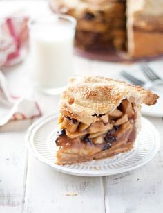 a piece of pie sitting on top of a white plate