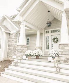 the instagram page on this house is full of white flowers and greenery,