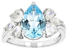 3.00ct Pear Shape Sky Blue Glacier Topaz™ With 5x3mm Pear Shape, 5x2.5mm Marquise & 4.5mm Heart Shape Rainbow Moonstone Rhodium Over Sterling Silver Ring. Measures Approximately 0.79"L x 0.50"W. Not Sizeable. Anniversary Hallmarked Topaz Crystal Ring, Hallmarked Sterling Silver Topaz Ring, Elegant Pear-shaped Topaz Ring In Sterling Silver, Blue Topaz Ring Silver Jtv, Luxury Sterling Silver Sapphire-colored Topaz Ring, Sky Blue Topaz, Pear Shape, Rainbow Moonstone, Heart Shape