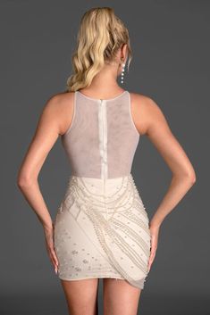 Enhance your charm with our corset pearl chain dress. The dress features a corset-style bodice that accentuates your figure and adds a touch of allure. The pearl chain detailing adds a luxurious and glamorous touch, perfect for making a statement at any event. The sleeveless design and mini length create a chic and stylish look, perfect for showing off your legs. Handmade customization Fabric composition: 90% polyester fiber, 10% spandex Washing method: hand wash or dry clean Popular elements: p Elegant Corset With Sweetheart Neckline For Gala, Elegant Sweetheart Neckline Corset For Gala, Elegant Corset For Gala And Prom Season, Elegant Sweetheart Neckline Corset For Prom Season, Elegant Gala Corset With Corset Back, Elegant Evening Corset With Corset Back, Glamorous Corset With Sheer Bodice For Gala, Elegant Corset With Corset Back For Evening, Elegant Corset With Corset Back For Gala