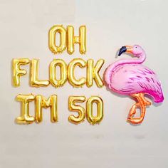 balloons that say oh flock i'm 50 and a flamingo balloon in the shape of letters