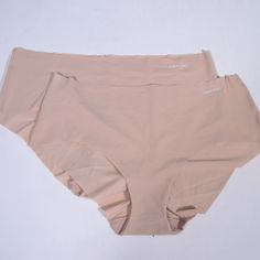 Brand New Calvin Klein Invisible Hipster Panties, Size Large, Set Of 2 Silky Stretchy 73% Polyamide, 27% Elastane In Nude Beige Color 100% Cotton Crotch Liner 13" Across Top Waist Calvin Klein Seamless Micro-elastic Bottoms, Calvin Klein Seamless Solid Bottoms, Womens Calvin Klein, Beige Color, Women's Intimates, Calvin Klein, Brand New, Women Shopping, Color