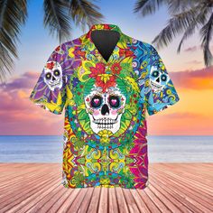 AIO Pride Colorful Sugar Skull Hawaiian Shirt All of our Hawaiian Shirt   are custom-made-to-order and handcrafted to the highest quality standards. Each shirt is constructed from a premium polyester blend that is ultra-soft and incredibly comfortable. This shirt has some great features, four-way stretch, short sleeve, lapel collar, button closure. Extremely soft to the touch, durable and breathable. Features a specialty high definition heat-dye application that ensures long lasting color vibran Hoodie Zip, Hawaii Shirt, Skull Design, Beach Shirts, Casual Shirt, Hoodie Dress, Summer Shirts, Sugar Skull, Casual Shirts For Men