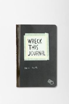 a book with writing on it that says wreck this journal written in black and white