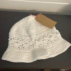 White Hand Crocheted Bucket Hat Vintage Retro Style 23.25" Outdoor Handmade Knit Sun Beach Floppy Brim Open Stitch Band Accent Cotton Enjoy all kinds of weather with this vintage / retro style hat! Measurements: Approx. 23.25” around/circumference @ rim & 10” tall. 2" Brim Care Instructions: Machine washable & air dry flat Materials: 100% Cotton Perfect for: Spring, summer, fall, winter, year round, outdoor, weather, everyday, daily, work, street, knit, office, indoor, outdoor, sunny, garden, be Lightweight White Bucket Hat For Beach, White Lightweight Bucket Hat For The Beach, White Lightweight Bucket Hat For Beach, Lightweight White Bucket Hat For Vacation, White Handmade Casual Straw Hat, White Beachy Hat, One Size Fits Most, Casual White Handmade Straw Hat, White Beachy Sun Hat One Size Fits Most, White Beachy Hat