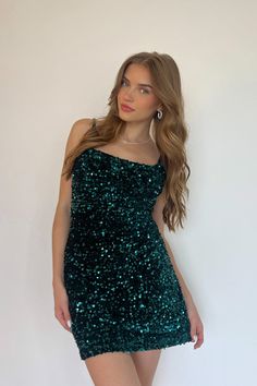 Ready to party in the Tori Velvet Sequin Mini Dress! This dark green beauty features all over sequins, a subtle scoop neckline, and a bodycon silhouette. Throw on your favorite pair of heels and you'll be ready to dance! Details 100% Polyester Fully lined Adjustable spaghetti straps Hidden back zipper Material has some stretch Dry clean only Dress For Homecoming, Formal Mini Dress, Beauty Features, Red Bodycon, Mini Dress Formal, Green Sequins, Flare Mini Dress, Favorite Sweater, Sequin Mini